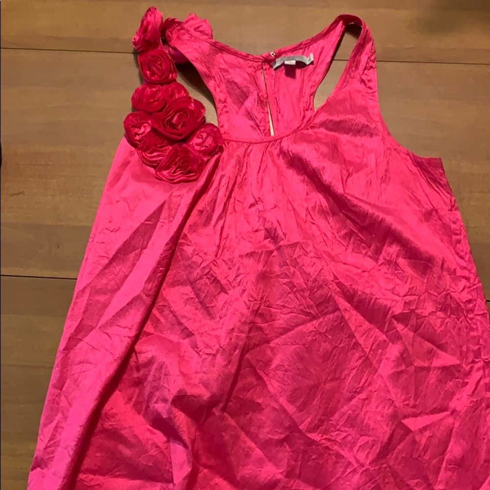 Beautiful pink blouse with rosettes